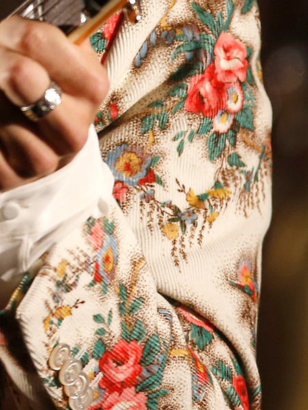 styleslookbook:Harry wore a custom Gucci floral printed suit for the opening night of his tour in Sa