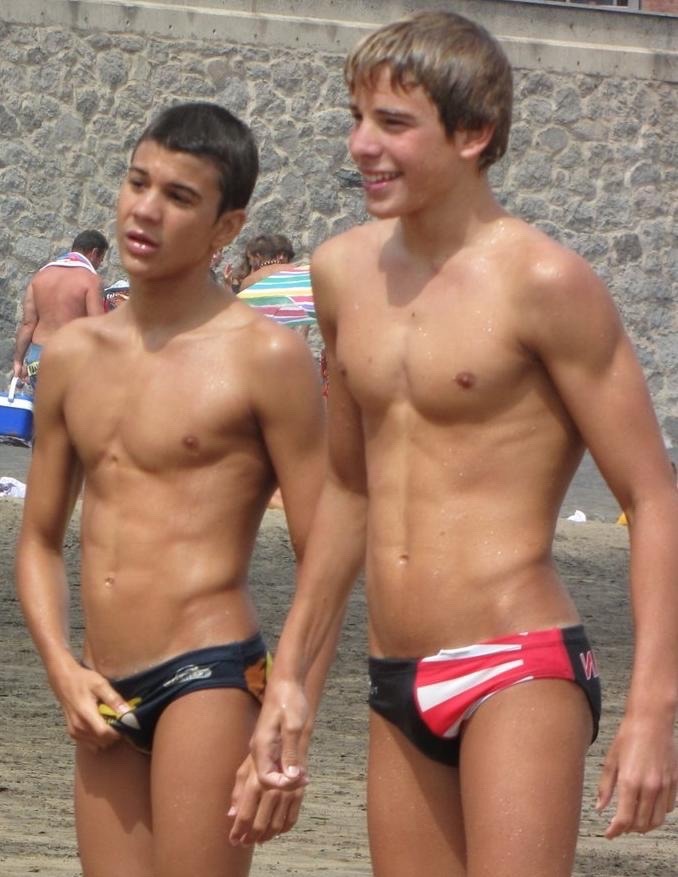 Skinny teen boys at beach