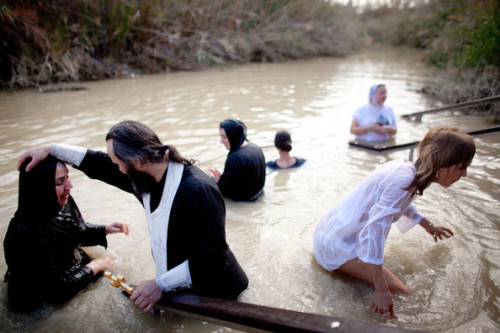 christianityoutsidethewest:Orthodox Christians Celebrate Epiphany At The River Jordan, Eritrean Orth