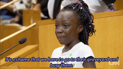 imablackqueenbitch:bellygangstaboo:A young girl climbed up a step ladder to stand at the podium befo