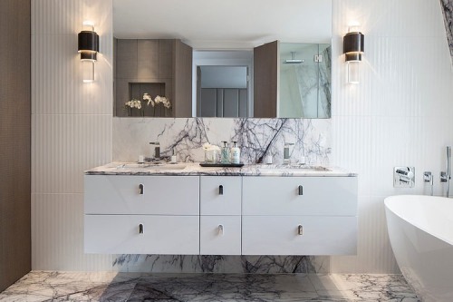 {The stairwell light installation in this apartment by London-based Roselind Wilson Design caught my