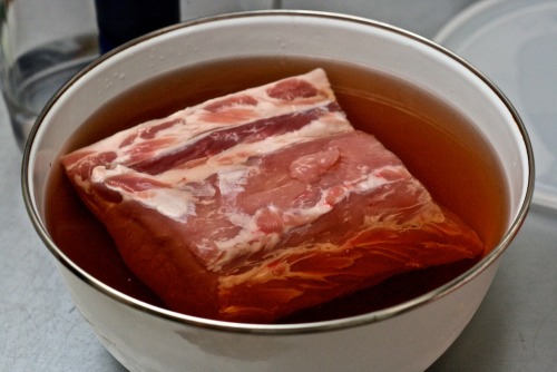 Caffeinated Bacon Ingredients: A joint of either loin or belly of pork. 2l of cold water. ½ cup kosh