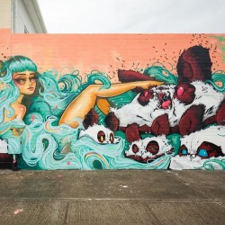 powwowblog:  Finished mural by @tatunga and @woes in Kakaako, Hawaii for #powwowhawaii. Photo by @bshigeta. @rvca @montanacans @flexfit @hawaiianairlines