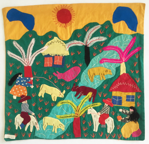 Another traditional Panamanian mola from our collection. This farm scene was created using embroider