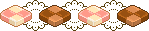 a small divider made up of 4 checkerboard cookies. there are strawberry ones and chocolate ones in a pattern placed on lace.