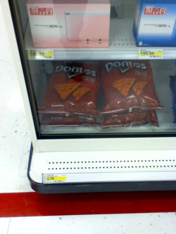 auwa:  usamericunt:  i went to target and for some fucking reason, they fucking put doritos bags in the same fucking shelves as the 3ds consoles, behind locked windows in the fucking electronic section ??????????????????  yeah this is weird why aren’t