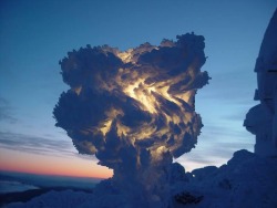 reem&ndash;x:  This is not a cloud, it is just a street light covered with snow.