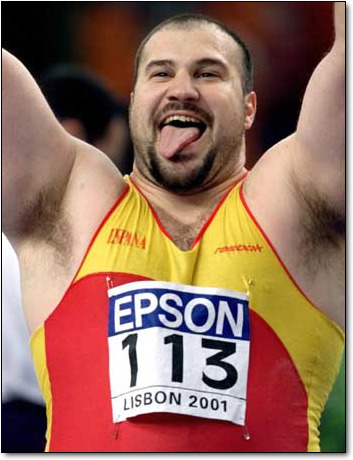 herofiend1983:  How to stay warm on a cold winter’s night….  Hot men like former Olympic Shotputter Manuel Martinez of Spain! Check out my new tumblr page “Facial Hair Fetish”…. Where the men are separated from the boys!  