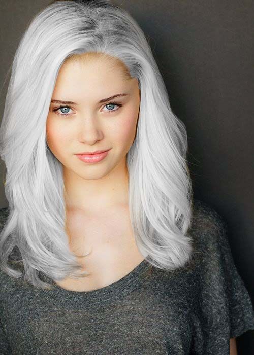 White blonde hair dark eyebrows