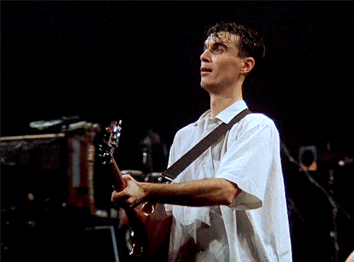 ripleyholden:David Byrne of Talking Heads performing Crosseyed And Painless in Los Angeles, December 1983.