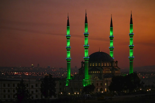 The minarets of Nizamiye Masjid glowing in the night, the largest mosque in southern hemisphere, Joh