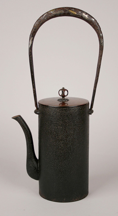 japaneseaesthetics:  Tetsubin or teapot of iron in a tall cylindrical form with an elongated ha