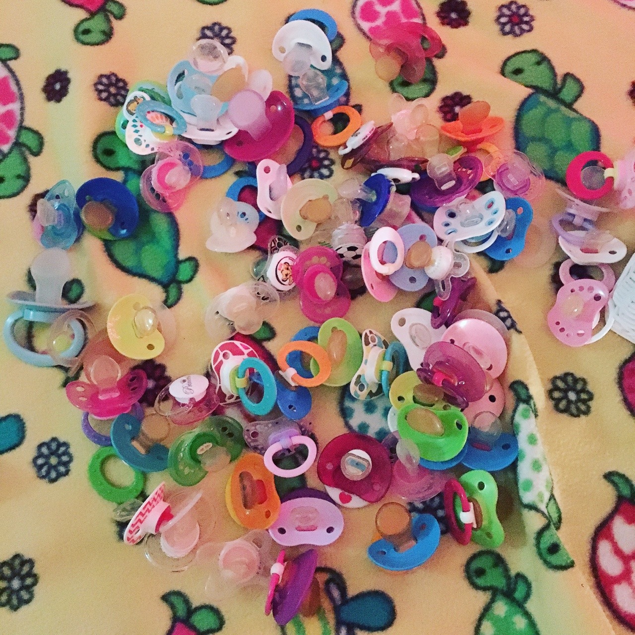 So many pacifiers to choose from! This isn&rsquo;t even my whole collection.