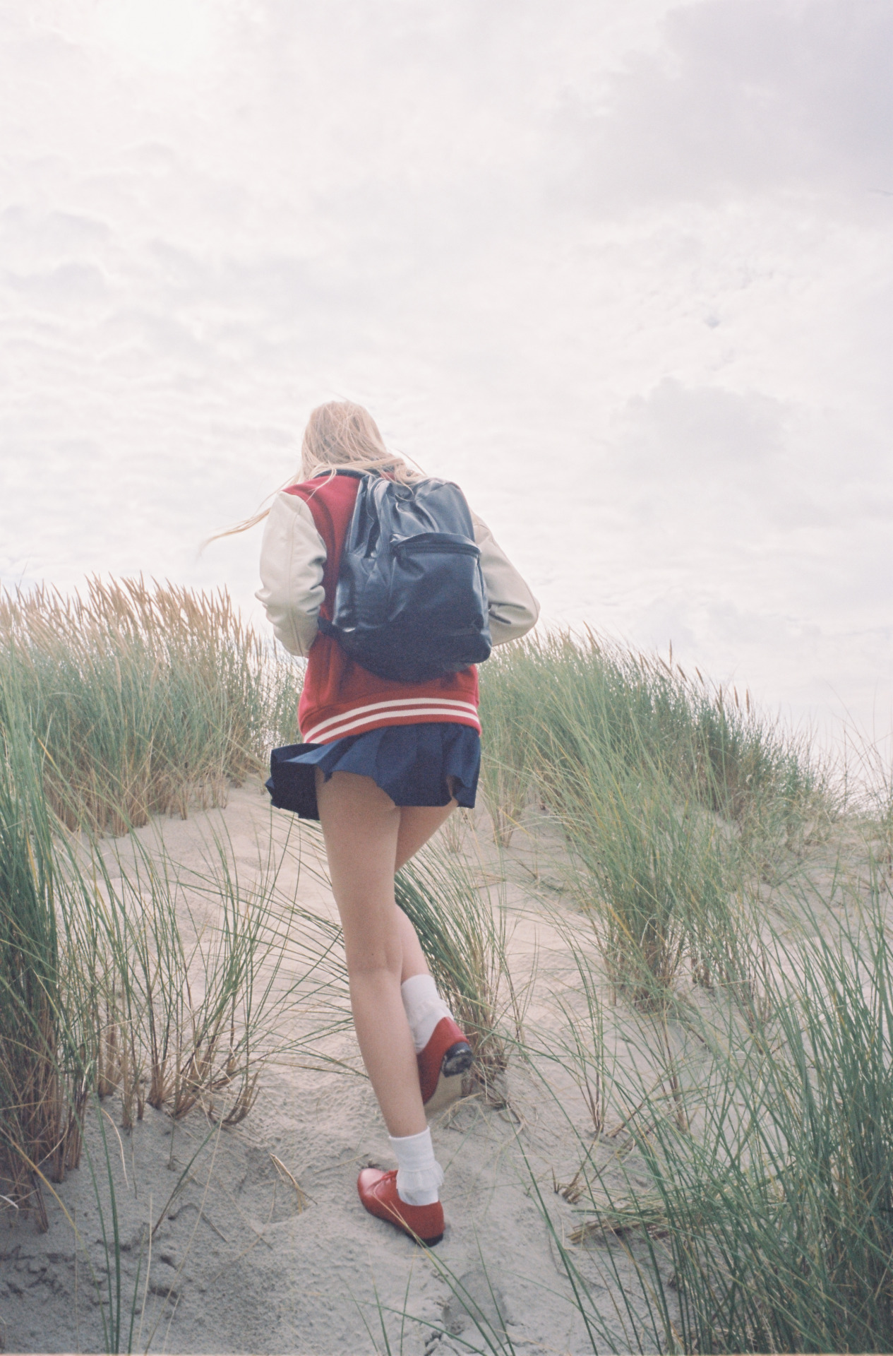 americanapparel:  Mathilde in the Club Jacket, Tennis Skirt &amp; Shiny School