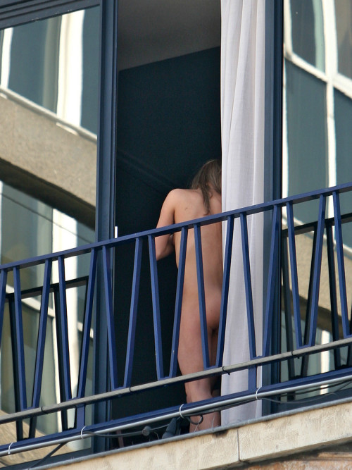 XXX Naked on balcony photo