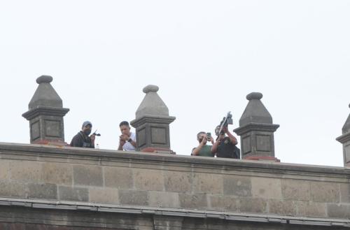 Snipers on the roof. Right now in Mexico City. They have gassed the (mostly) women demonstrating. Pl