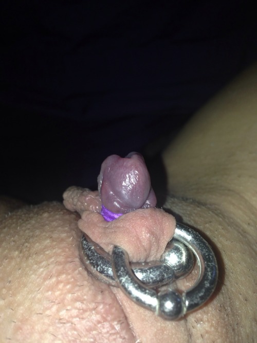 pussymodsgalore  Still not 100% sure what is happening here, and the only other comment “Wow. Love it” is no help! First the bit that seems clear, a vacuum pumped clit that has been tied off.  Second a pierced clithood with a HCH and ring.