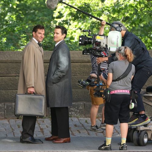 Bradley Cooper and Matt Bomer kissing on the set of Maestro