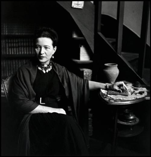 beauvoiriana:Simone de Beauvoir at her apartment. Paris, 1952. Photo: Elliott Erwitt.
