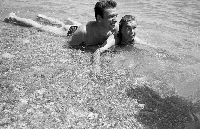 Simone Signoret and Yves Montand photographed by Walter Carone on The French Rivieira, 1951.