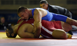 basketballpants:  The red sexy guy is erecting in the wrestling…. 