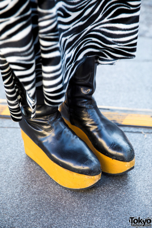 Japanese vintage shop buyer Kifujin on the street in Harajuku wearing fashion from Vivienne Westwood