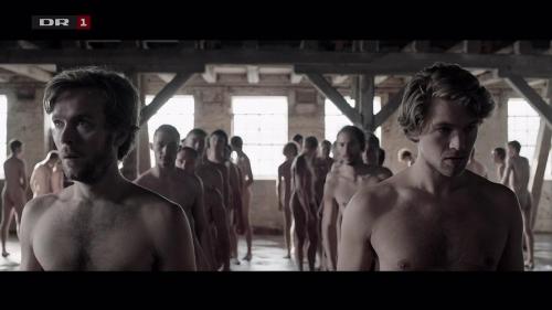 notdbd:Scenes from the Danish TV series 1864, starring Jens Sætter-Lassen and Jakob Oftebro. Young men line up nude for their military medical exams, and a joyful lad celebrates by standing over the sea naked. 