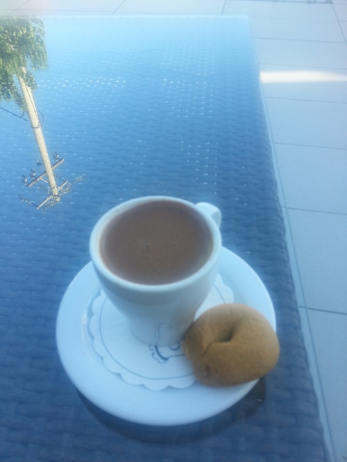 Greek coffee, always served with a delicious koulouraki :)  (submitted by @janwo) 