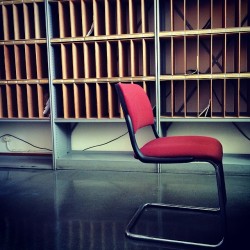 lonelychairsatcern:  #lonelychairsatcern chair in front of boxes #b4 #TH #CERN