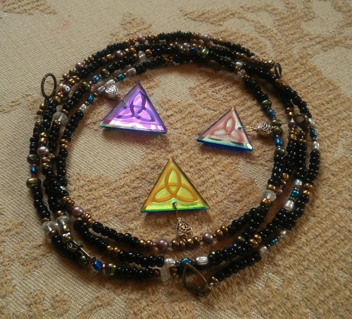 Cold worked dichroic glass jewels with beaded necklaces by Richard Elvis and Elsie Marie