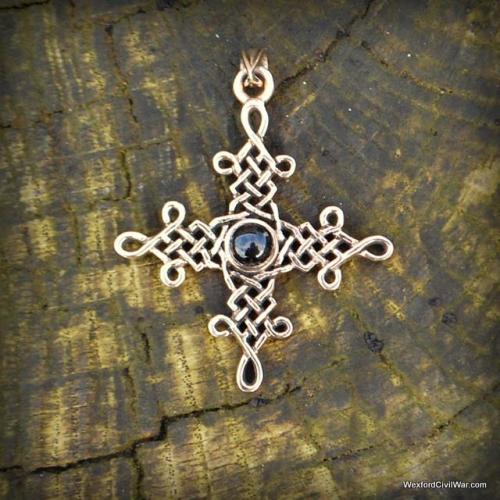This distinctive bronze jewellery piece is inspired by Late Medieval cross pendants. Available here: