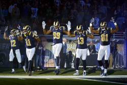 the-gasoline-station:  Hands Up, Don’t Shoot St. Louis Rams players Stedman Bailey, Tavon Austin, Jared Cook, Chris Givens and Kenny Britt came out onto the field in the “hands up, don’t shoot” pose before their game against the Oakland Raiders