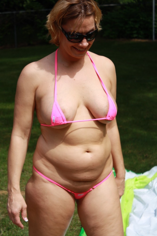 cuntspreader:  just hanging in the yard with the slut and her inappropriate bikini