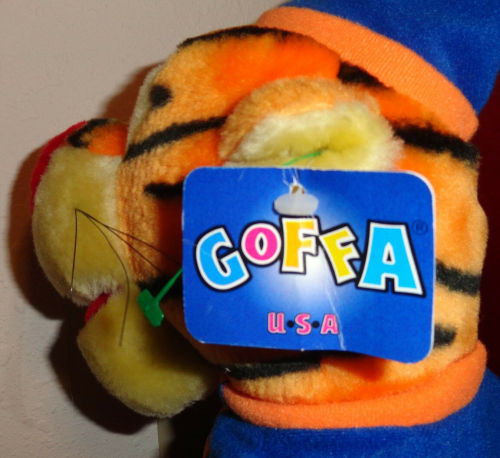 Bootleg Tigger plush wearing a shirt, a pair of shoes, and a night cap by GoffaeBay