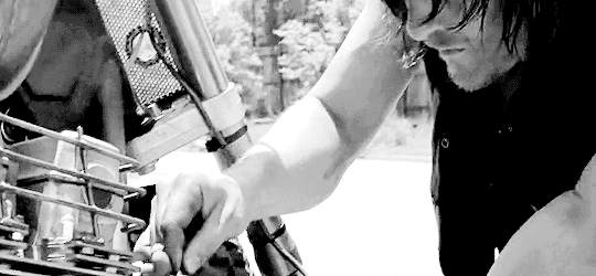 reedusgif:  my sexuality: Daryl fixing his bike