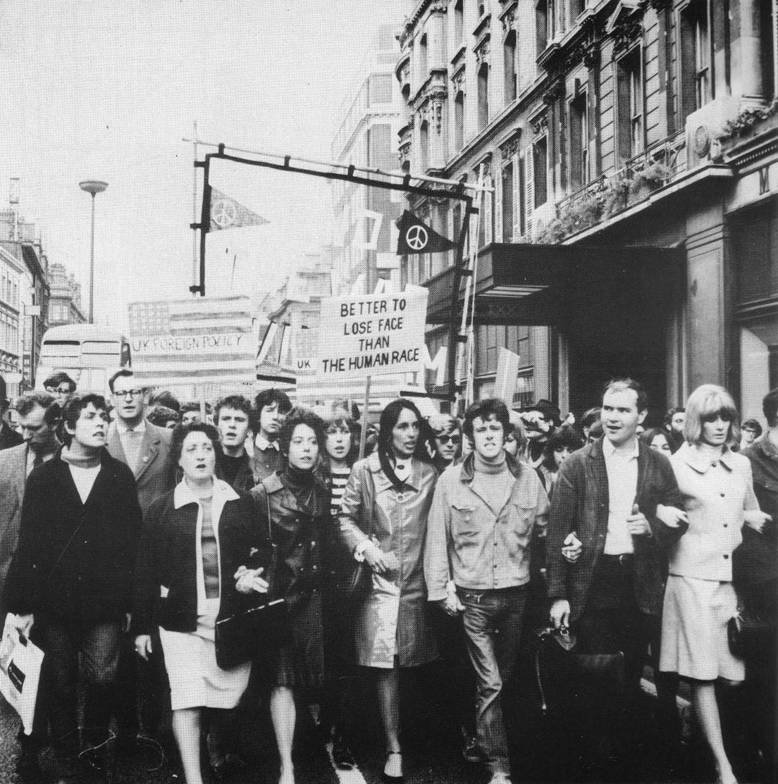 Campaign for Nuclear Disarmament, protest, 1965
And here come the rockers… Marc Bolan, Joan Baez and Donovan in the front row, there. Psych-folk resistance