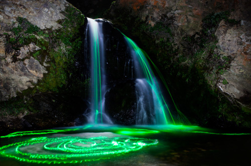 Like a freak midnight rainbow, this is a photography series of waterfalls titled Neon Luminance, part of a collaboration between Sean Lenz and Kristoffer Abildgaard. The duo dropped high-powered (and non-toxic) glow sticks into various waterfalls in