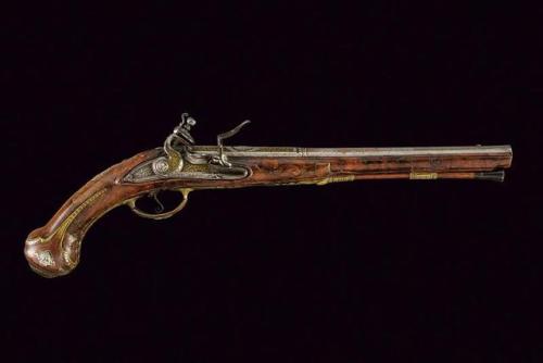 Ornate flintlock pistol crafted by Diego Zanoni of Brescia, Italy, mid 18th century.from Czerny’s In