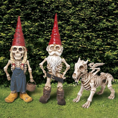obsessedwithskulls:  Man Woman And Dragon Skel-A-Gnome Garden Statue Set.AVAILABLE HERE –> http://amzn.to/1CDjAsC