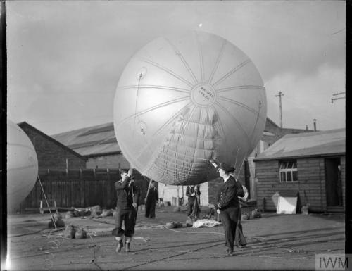 Ratings bring out an inflated barrage balloon, at Greenock or Gourock(Scotland, October 31st, 1941):