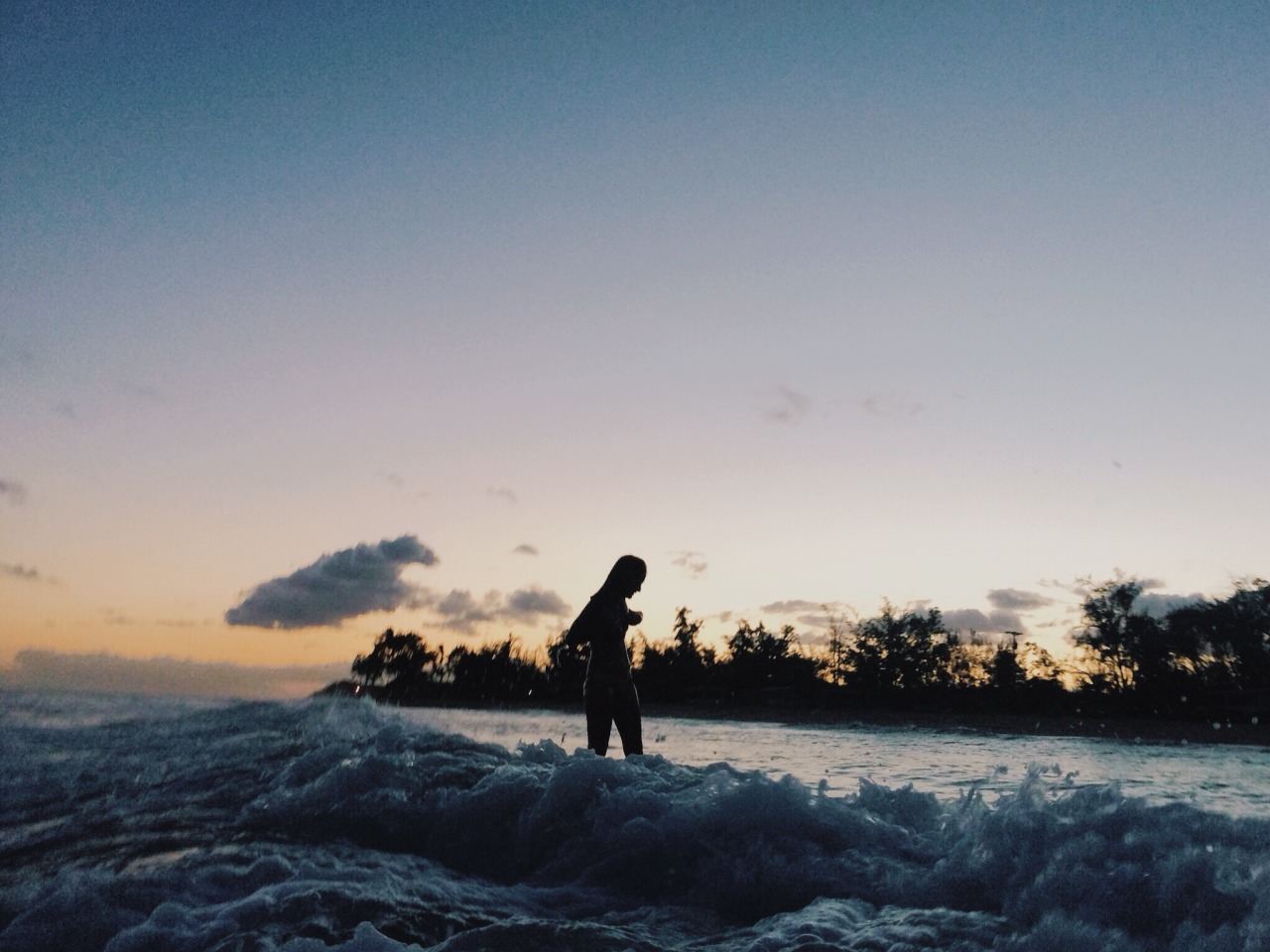 caseykaui:  sister and i surfing awhile ago