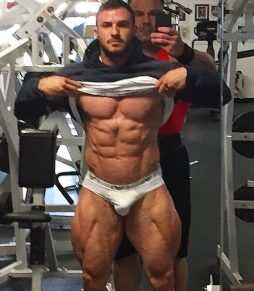 musclegodselfies:  Dennis Reinhold proudly showing off for Coach…