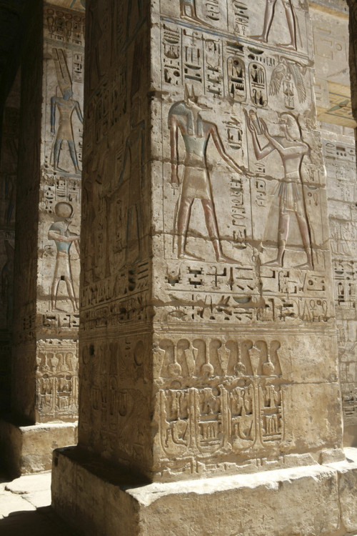 Medinet HabuView of the peristyle hall with pillars incised with hieroglyphic decorations in the mor