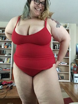thewelldocumentedslut:  Which swimsuit do you like better? Red or black?  Love the red one, shows off that sexy body a lot better