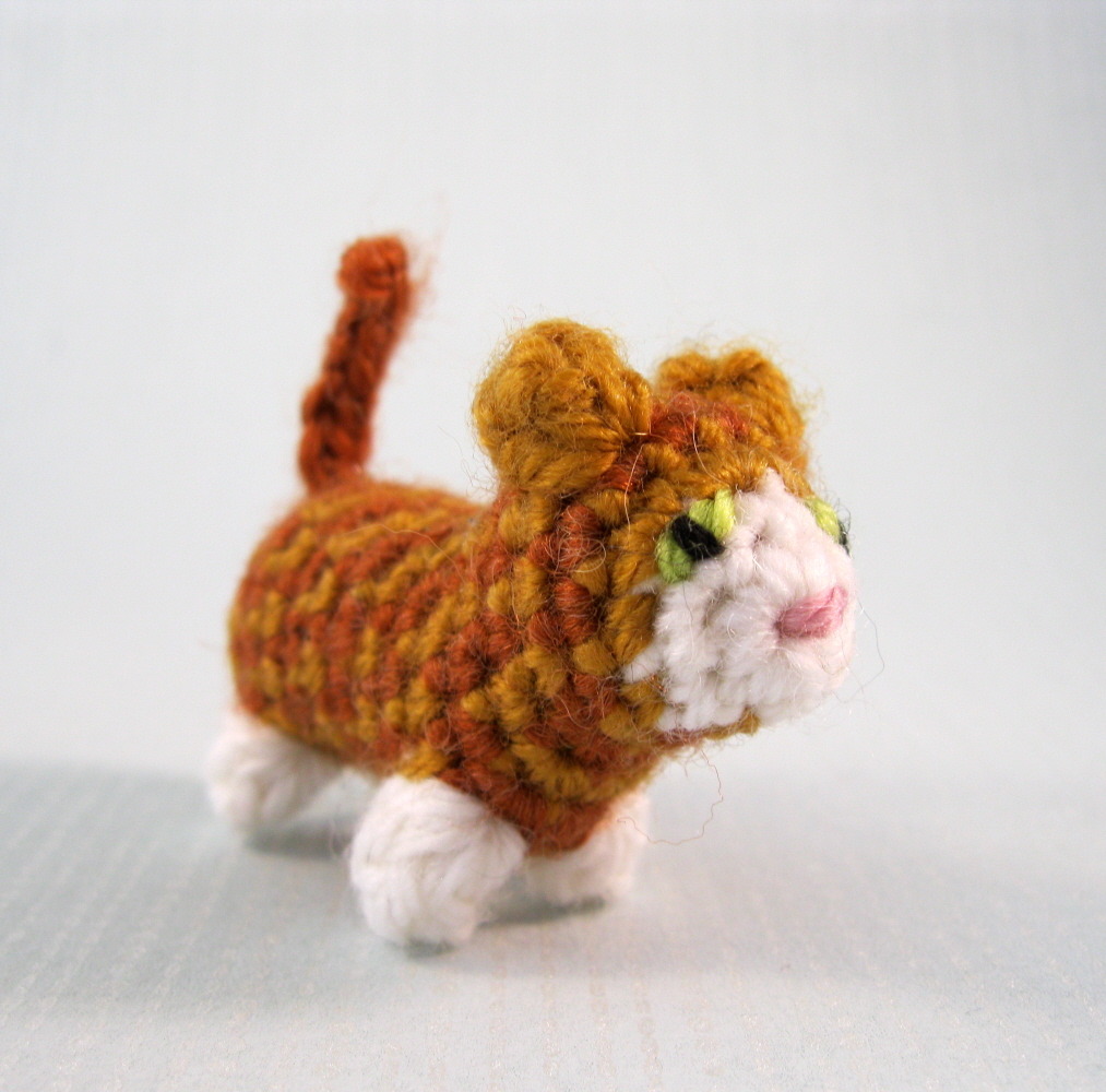 I've seen a lot of very cute needle-felted Christmas tree ornaments for sale recently, but then I think, 