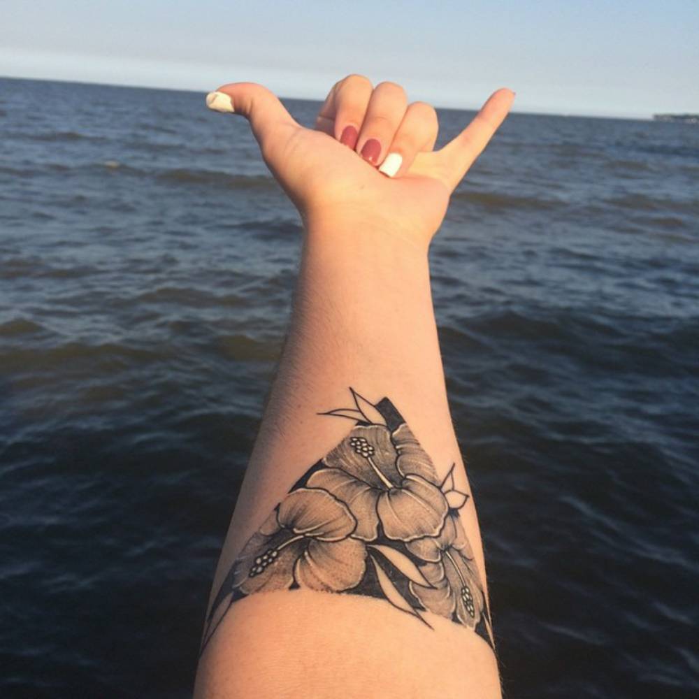 Triangle tattoo with three hibiscus flowers.... - Official Tumblr page for  Tattoofilter for Men and Women