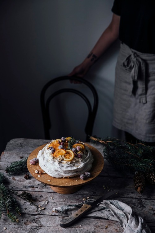 sweetoothgirl:  Christmas Pavlova w/ Sugared Cranberries and Orange & Citron Slices  