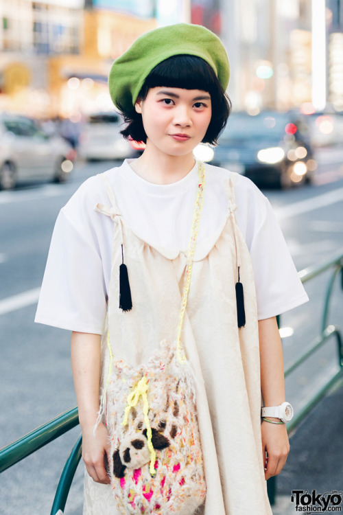 Japanese students Kasumi and Teiyu on the street in Harajuku wearing vintage and antique styles with