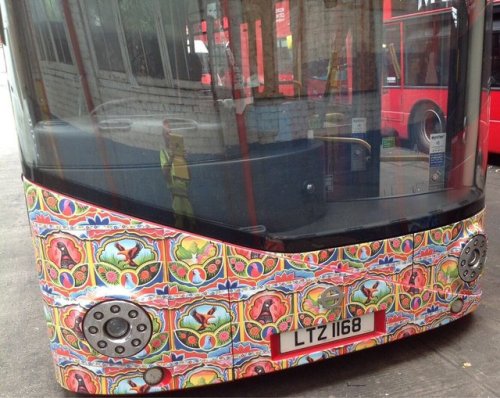  Double-Decker buses in London showing colours of Emerging Pakistan. 