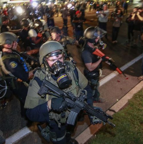 fogo-av:  mentalalchemy:  nezua:  fnhfal:  Ferguson -2014  I blinked one day and when I opened my eyes, it was normal to have an American army battling Americans on American streets. No one even calls it a war. But it is.  Don’t forget this crazy shit